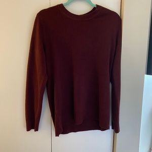 maroon colored crew neck sweater